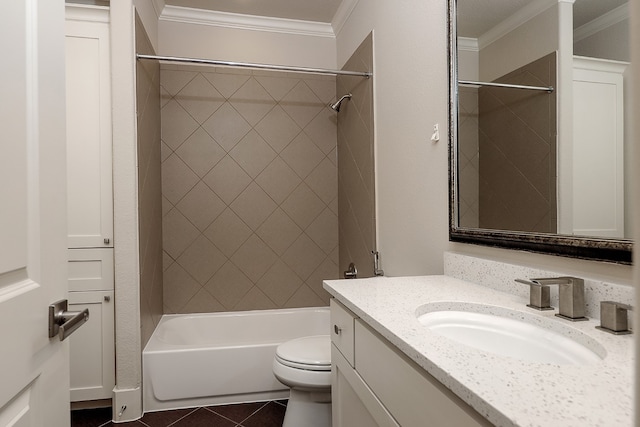 full bathroom featuring crown molding, vanity, toilet, and tiled shower / bath