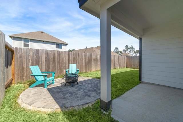 view of patio / terrace with a fire pit