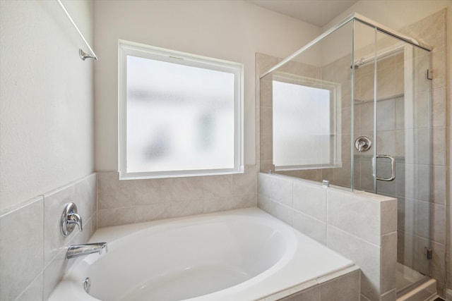 bathroom with independent shower and bath