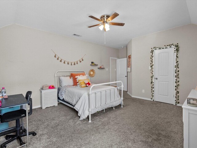 carpeted bedroom with lofted ceiling and ceiling fan