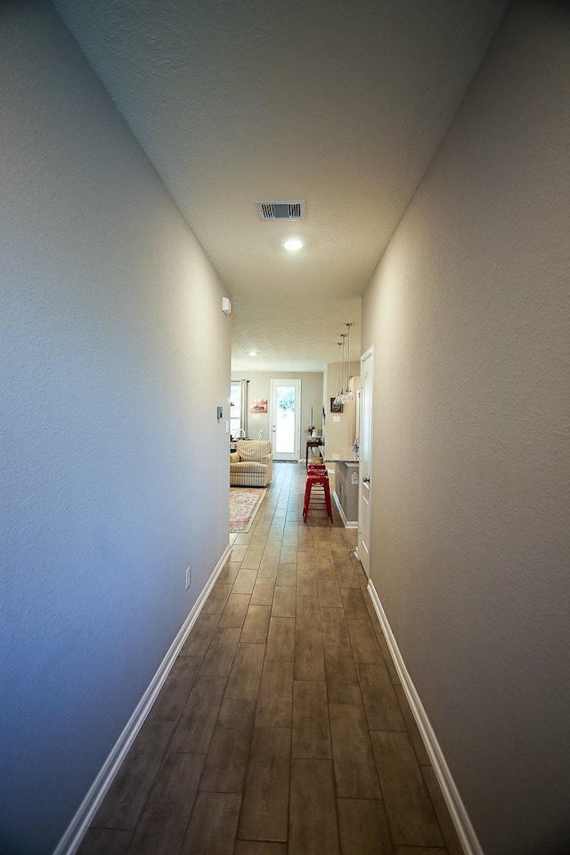 hall featuring dark hardwood / wood-style flooring