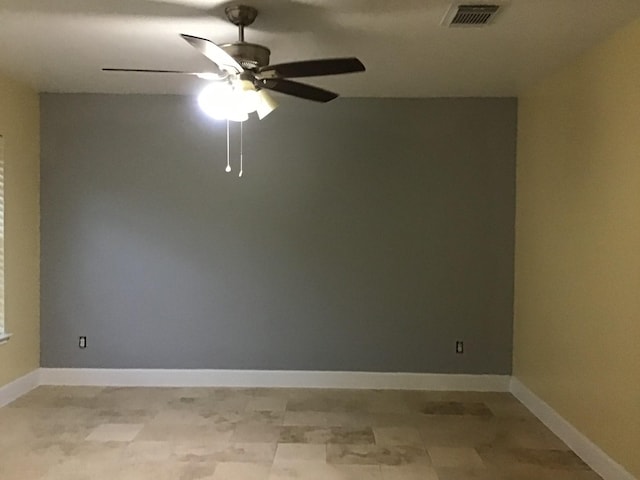 empty room featuring ceiling fan