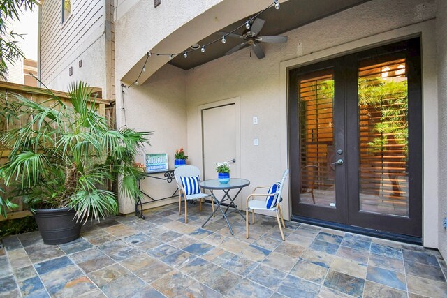 view of patio / terrace featuring french doors and ceiling fan