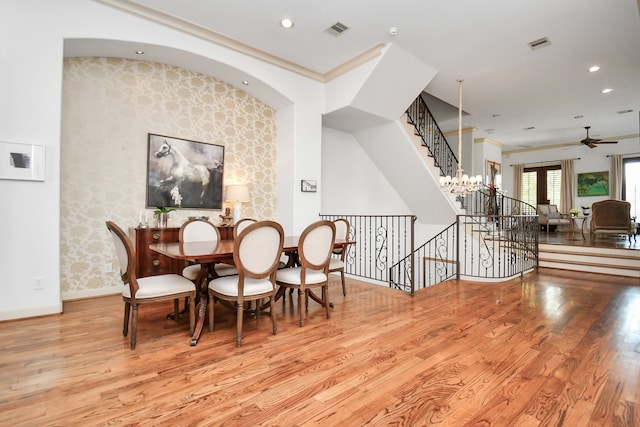 dining room featuring light hardwood / wood-style floors, french doors, and ceiling fan