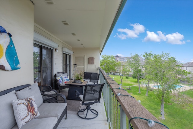 balcony featuring an outdoor living space