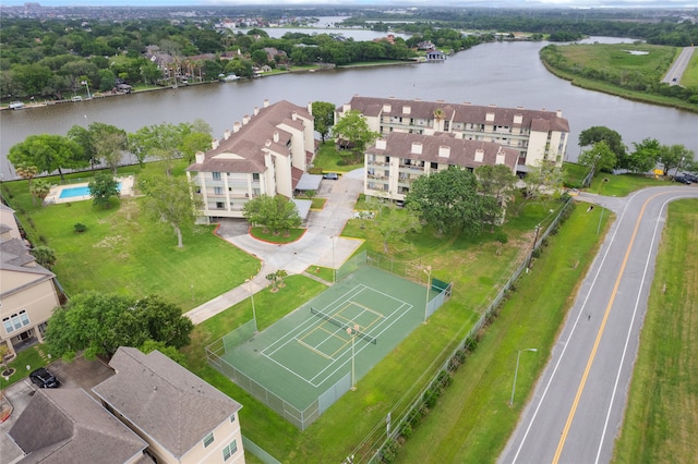 birds eye view of property with a water view