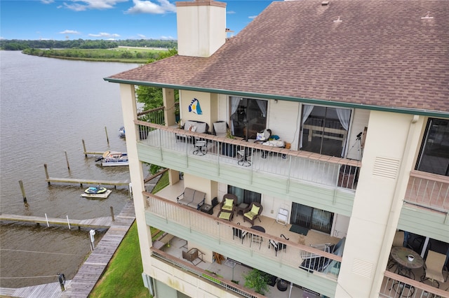 view of building exterior featuring a water view