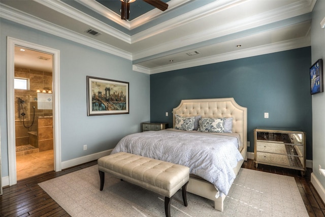 bedroom with ensuite bathroom, crown molding, ceiling fan, and dark hardwood / wood-style floors