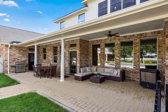 view of patio / terrace featuring outdoor lounge area, ceiling fan, and area for grilling