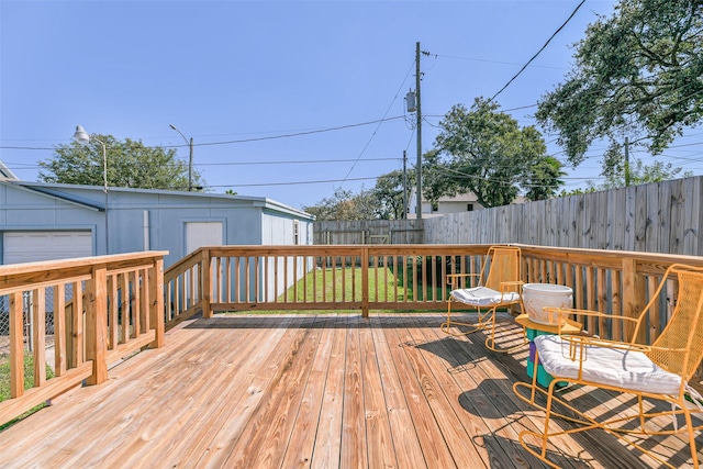 deck featuring a fenced backyard