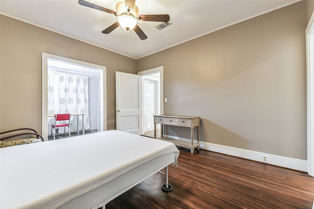 rec room featuring crown molding, dark hardwood / wood-style flooring, and ceiling fan