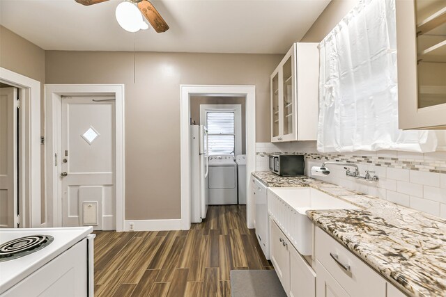 kitchen with ceiling fan, dark wood-type flooring, and white cabinetry