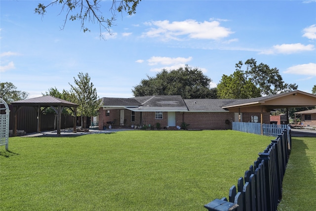 view of yard featuring a gazebo and a patio area