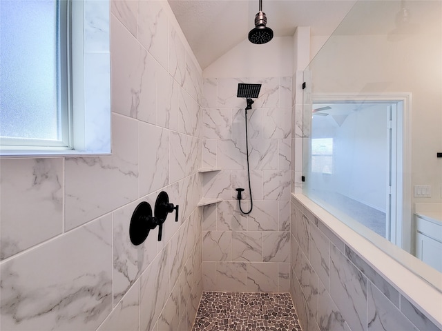 bathroom with tiled shower