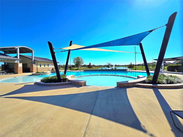 view of pool with a patio area