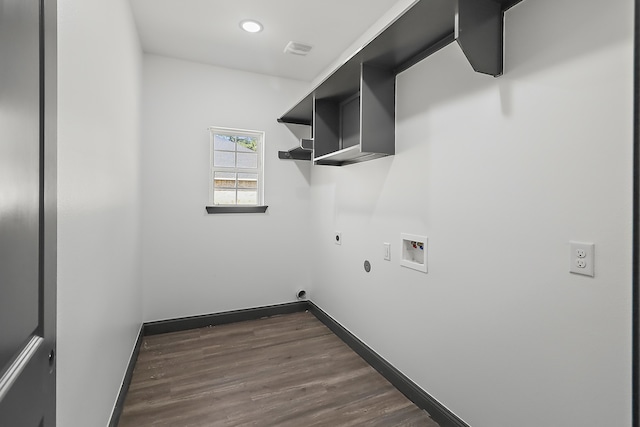 washroom featuring gas dryer hookup, electric dryer hookup, hookup for a washing machine, and dark hardwood / wood-style flooring