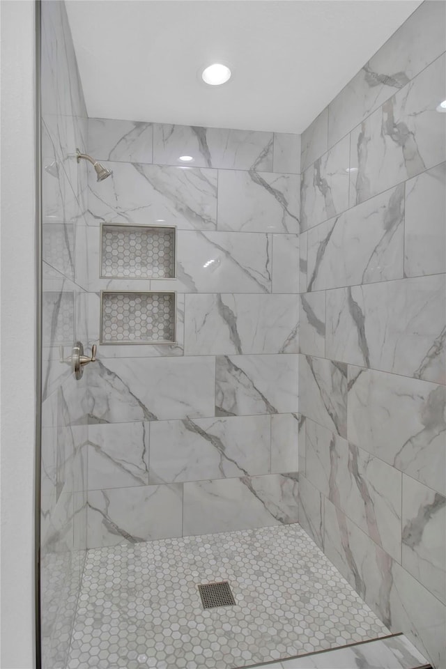 1307 Brooks Ave, Rosenberg, TX 77471 - bathroom featuring tiled shower