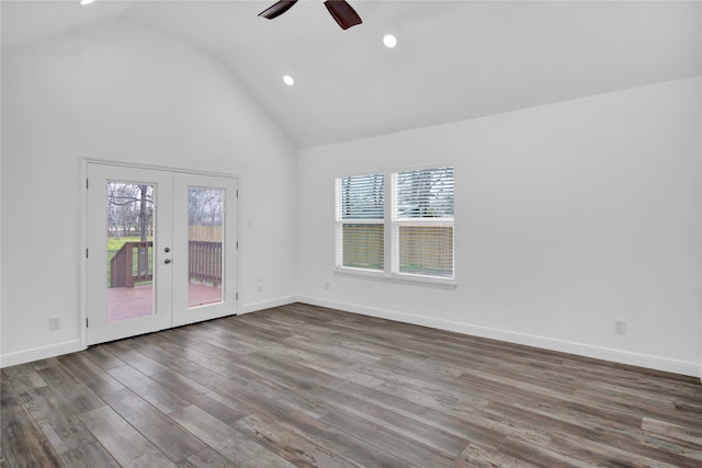 spare room featuring hardwood / wood-style floors, ceiling fan, french doors, and plenty of natural light