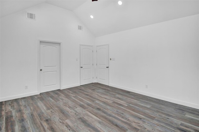 1307 Brooks Ave, Rosenberg, TX 77471 - empty room with high vaulted ceiling, wood finished floors, recessed lighting, and baseboards