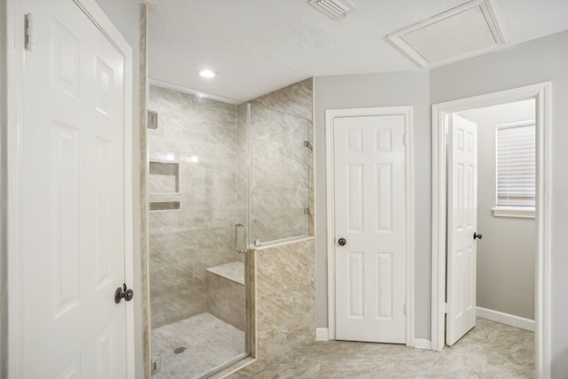 bathroom with an enclosed shower