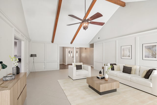 living room featuring beam ceiling, high vaulted ceiling, and ceiling fan