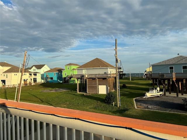 view of home's community featuring a yard