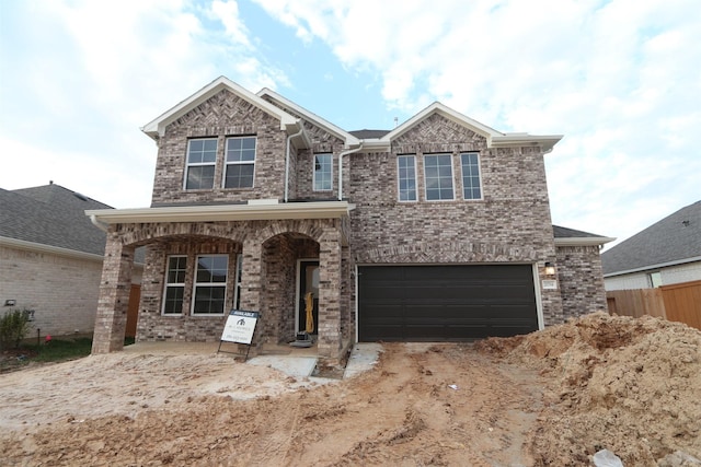 view of front of home with a garage