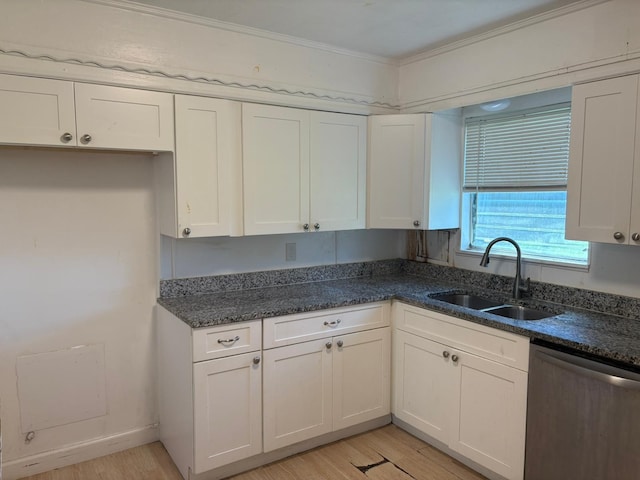 kitchen with light wood-type flooring, dishwasher, white cabinetry, and sink