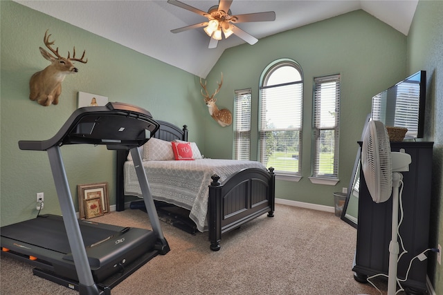 bedroom featuring ceiling fan, carpet flooring, and vaulted ceiling