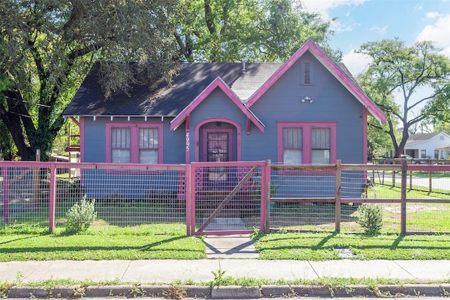 view of front of home with a front yard