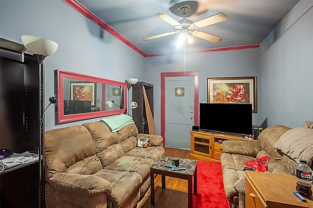 living room featuring ornamental molding, ceiling fan, and hardwood / wood-style flooring