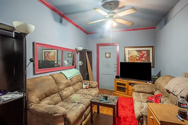 4995 Highland Ave, Beaumont, TX 77705 - living room with a ceiling fan, wood finished floors, and ornamental molding