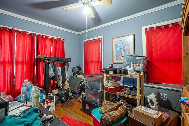 4995 Highland Ave, Beaumont, TX 77705 - bedroom featuring wood finished floors, crown molding, and ceiling fan