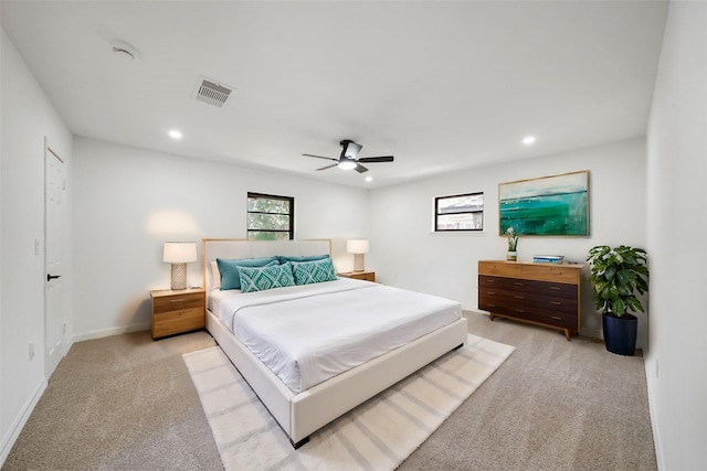 carpeted bedroom featuring ceiling fan