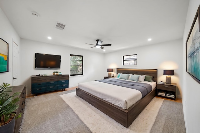 carpeted bedroom with ceiling fan