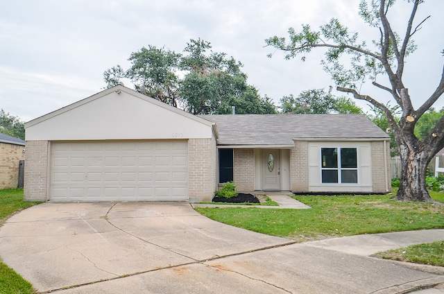 single story home with a garage and a front yard