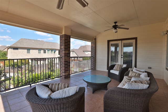 view of patio featuring ceiling fan and a balcony