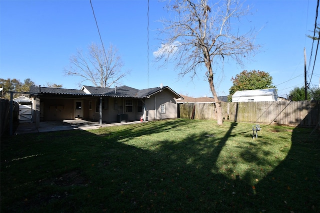 view of yard with a patio area