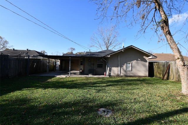 back of property featuring a patio area, a yard, and cooling unit