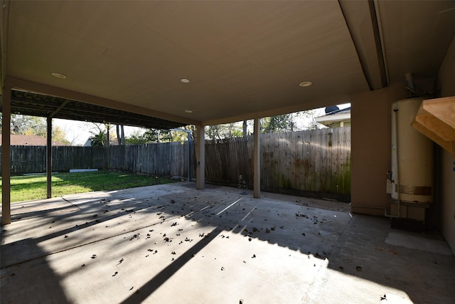 view of patio featuring gas water heater