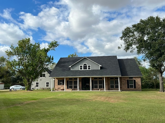 view of front facade with a front yard