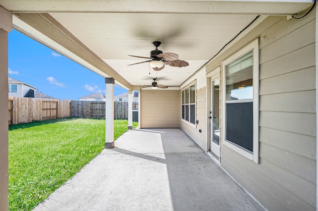 view of patio featuring ceiling fan