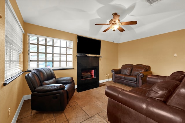 living room with ceiling fan