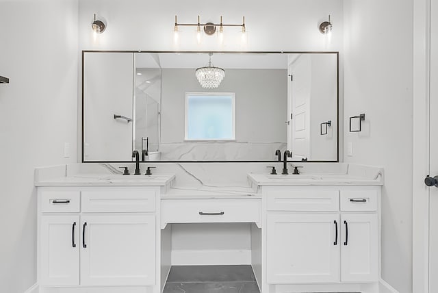 bathroom with vanity and an enclosed shower