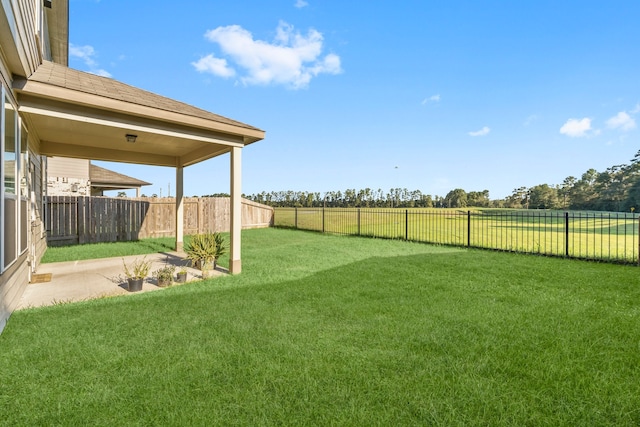 view of yard with a patio area