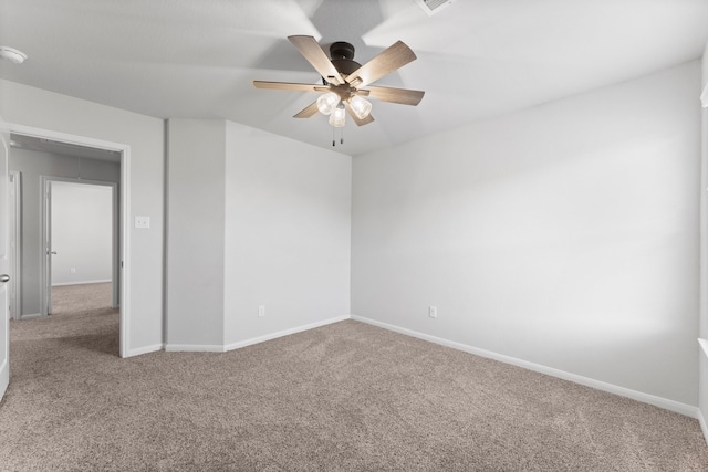 empty room with carpet flooring and ceiling fan