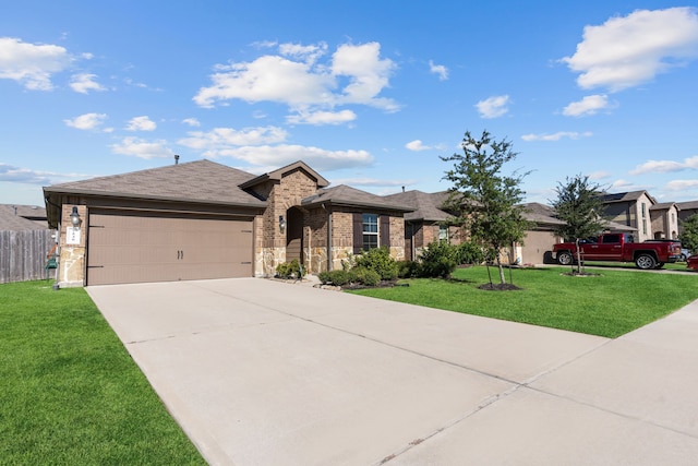 ranch-style home with a front yard and a garage