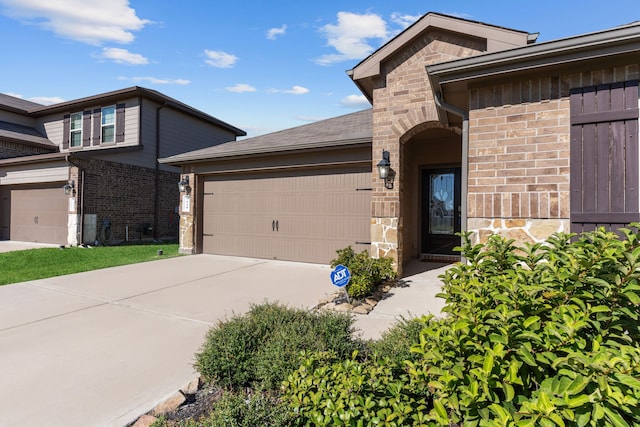 view of front of property featuring a garage