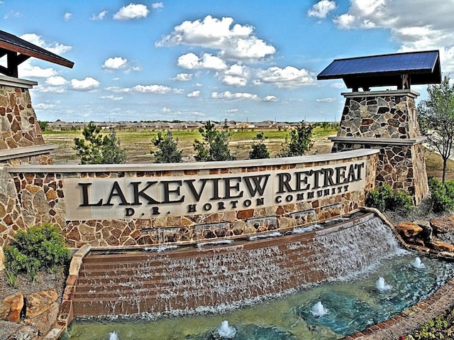 view of community sign