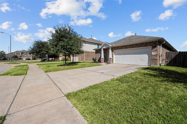 ranch-style house with a garage and a front yard